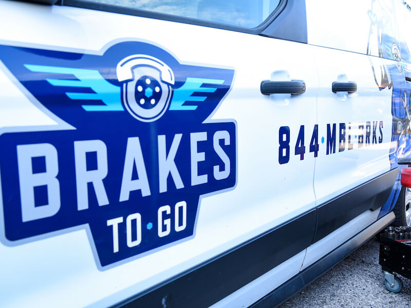 Brakes To Go logo on displayed on vehicle during a brake repair