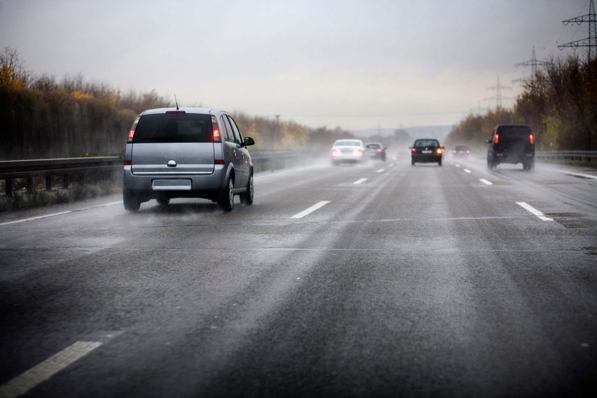 Cars driving on wet road